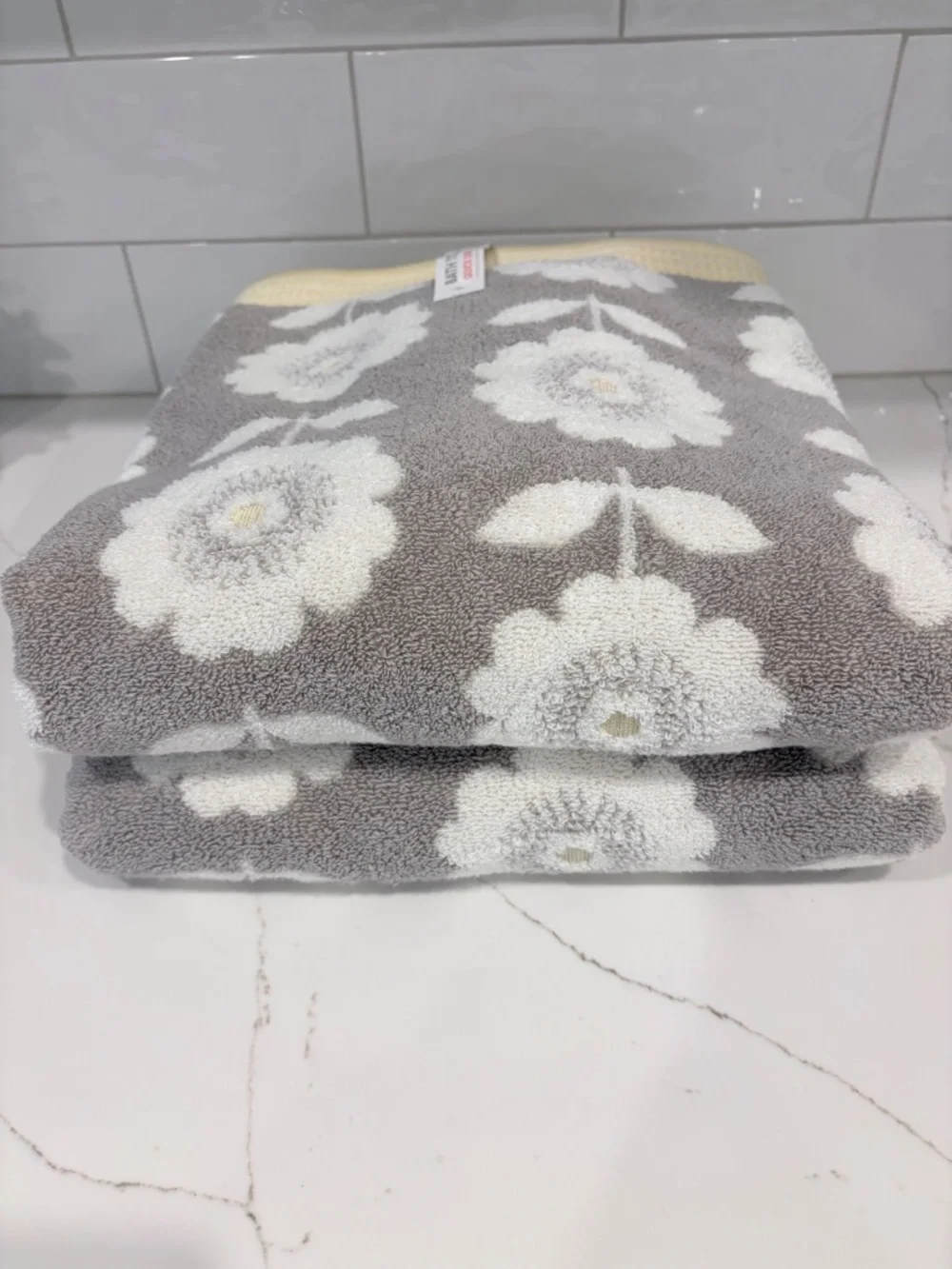 2 NWT Caro Bath Towels gray, yellow and white floral pattern